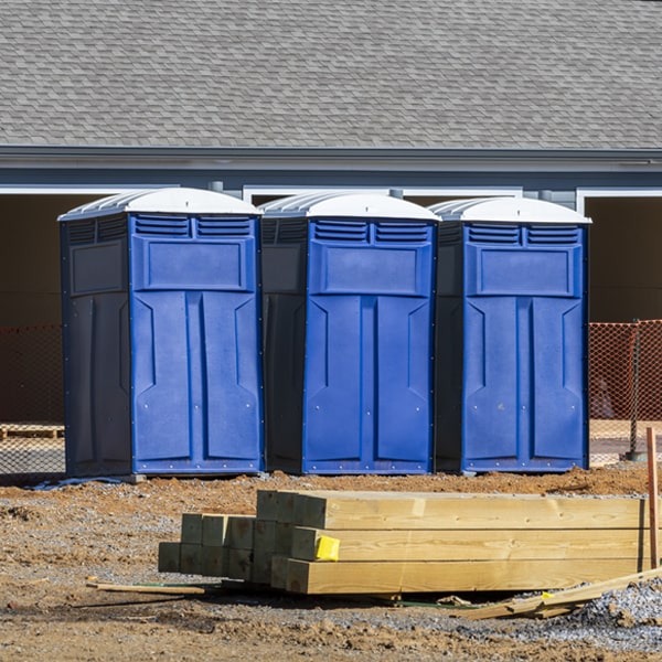 what is the cost difference between standard and deluxe portable toilet rentals in Cloverly